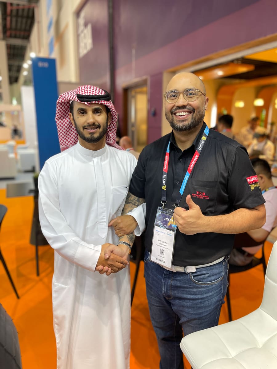 Handshake with a visitor at the stand